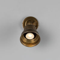 Sucre Antique Brass Industrial Spot Wall Light