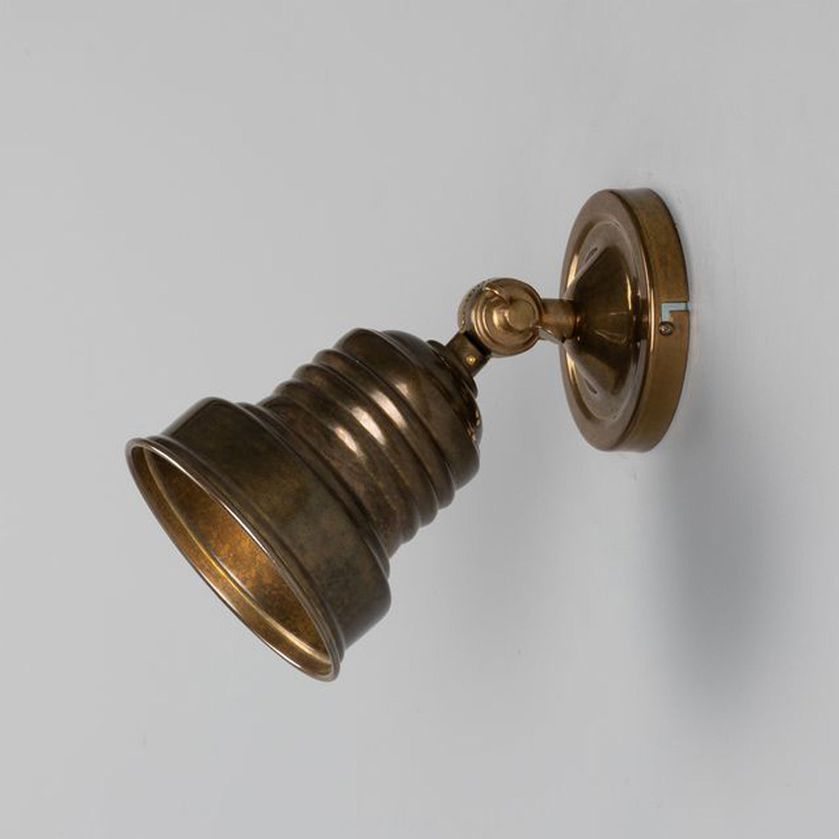 Sucre Antique Brass Industrial Spot Wall Light