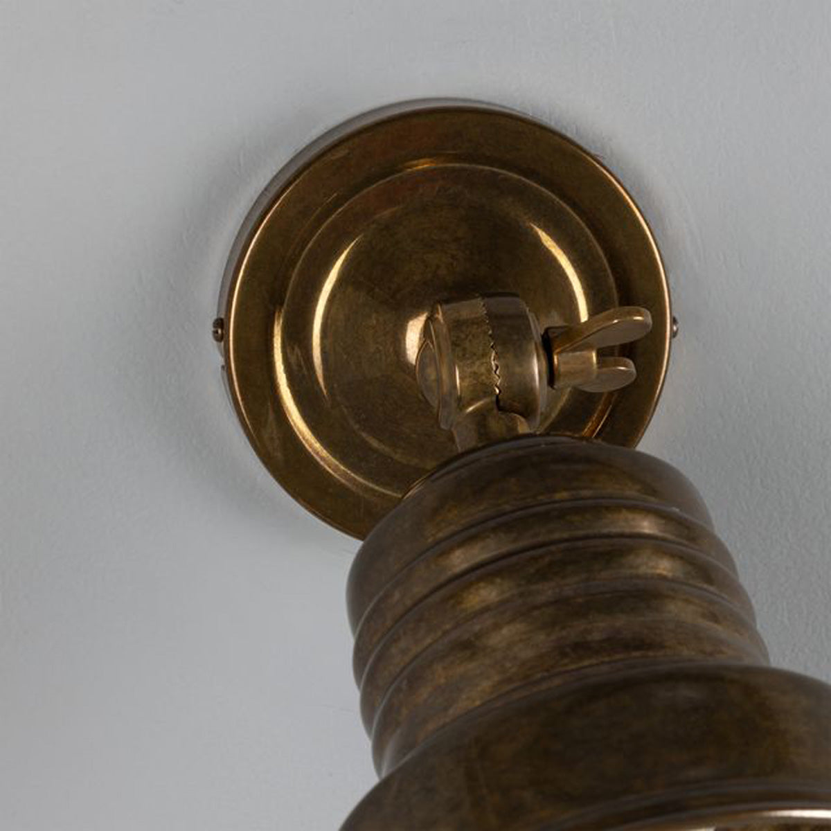 Sucre Antique Brass Industrial Spot Wall Light