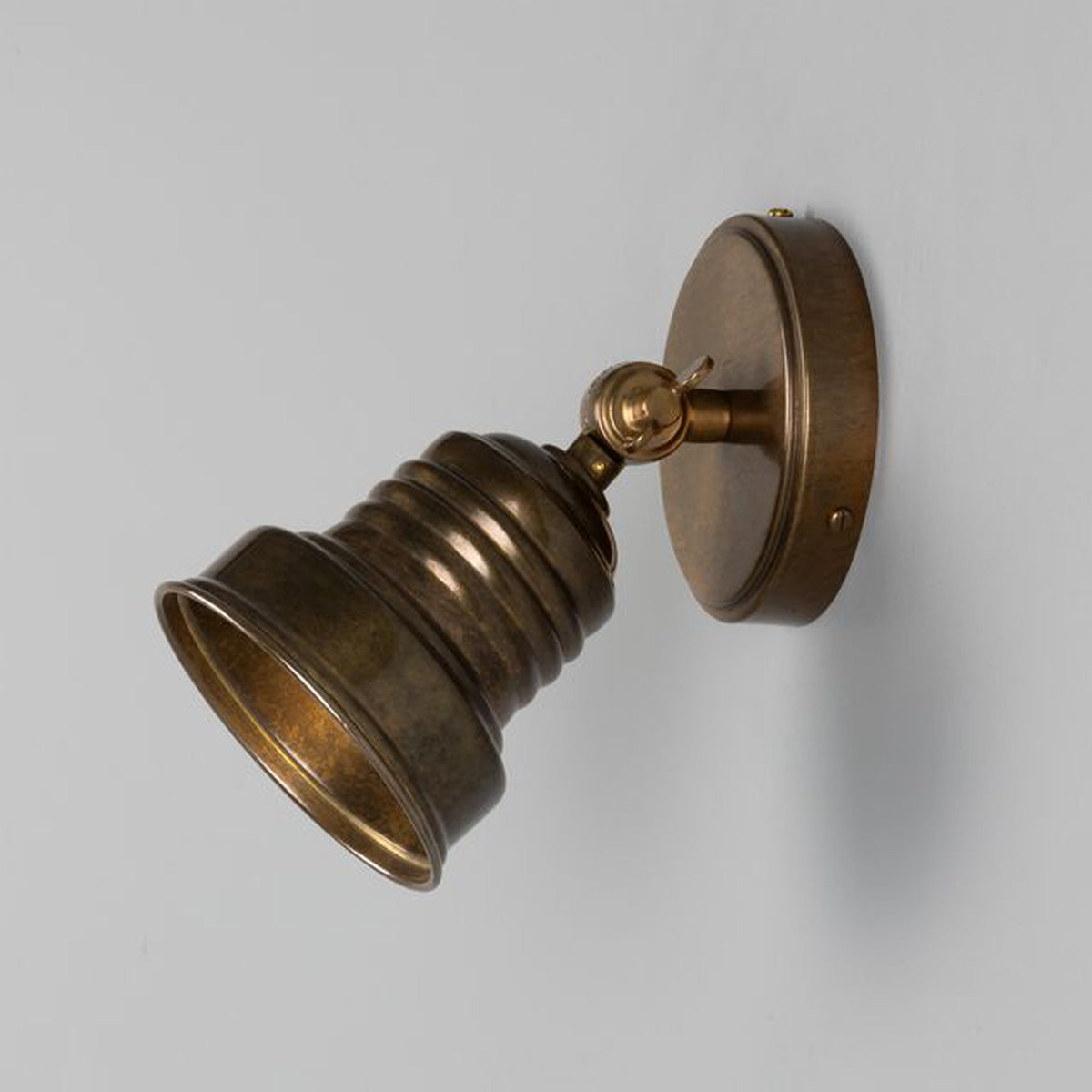 Sucre Antique Brass Industrial Spot Wall Light