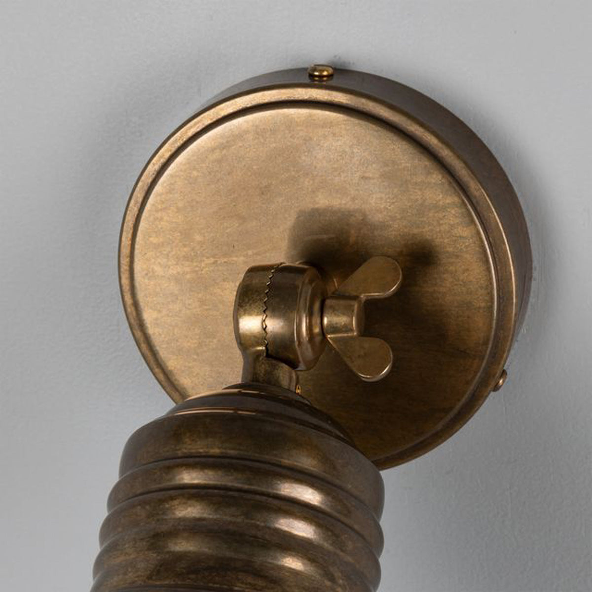 Sucre Antique Brass Industrial Spot Wall Light