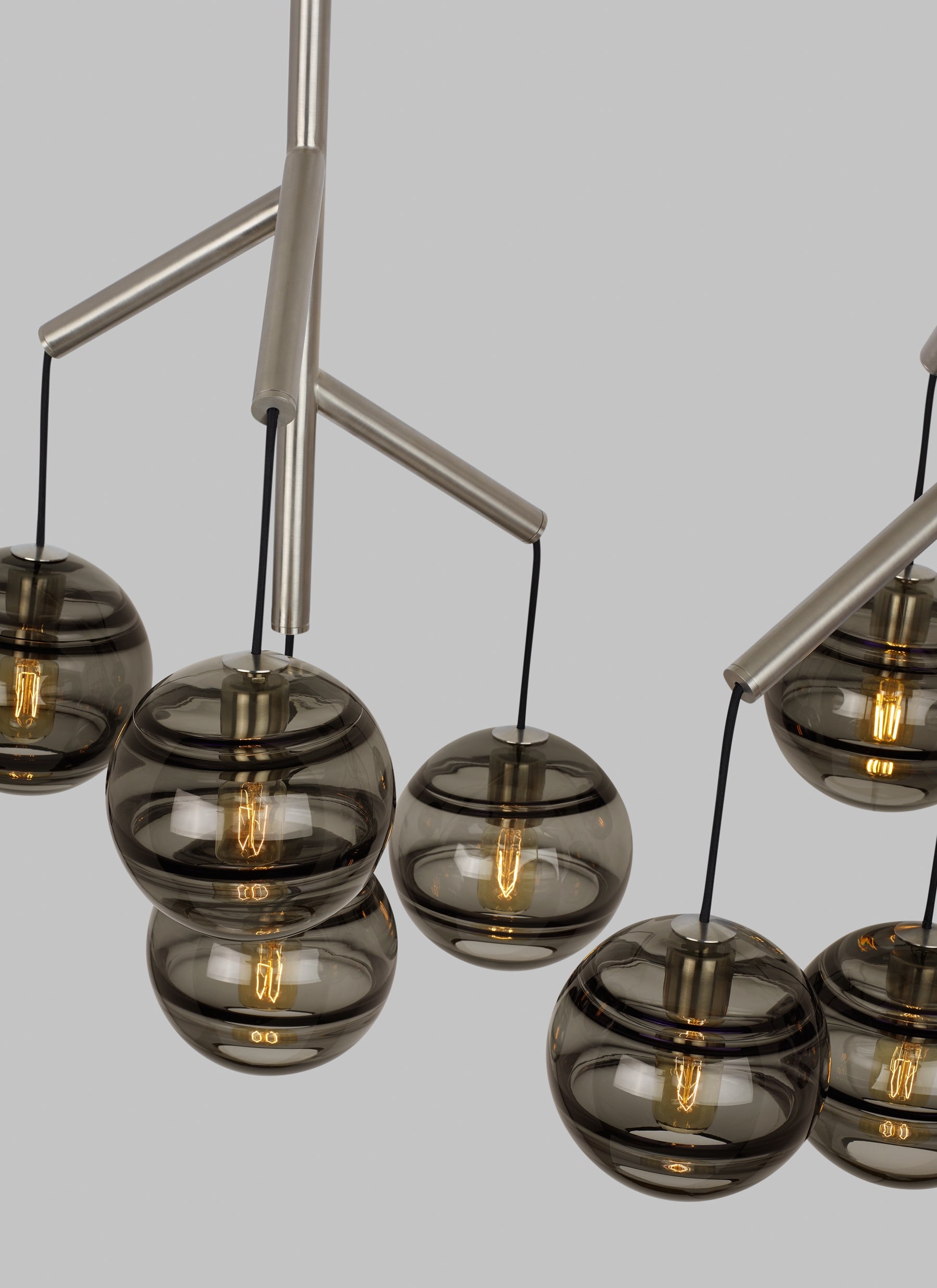 details of smoke glass globes from sedona chandelier by tech lighting