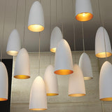 hanging mini signal pendants in rubberized white with copper and gold interiors