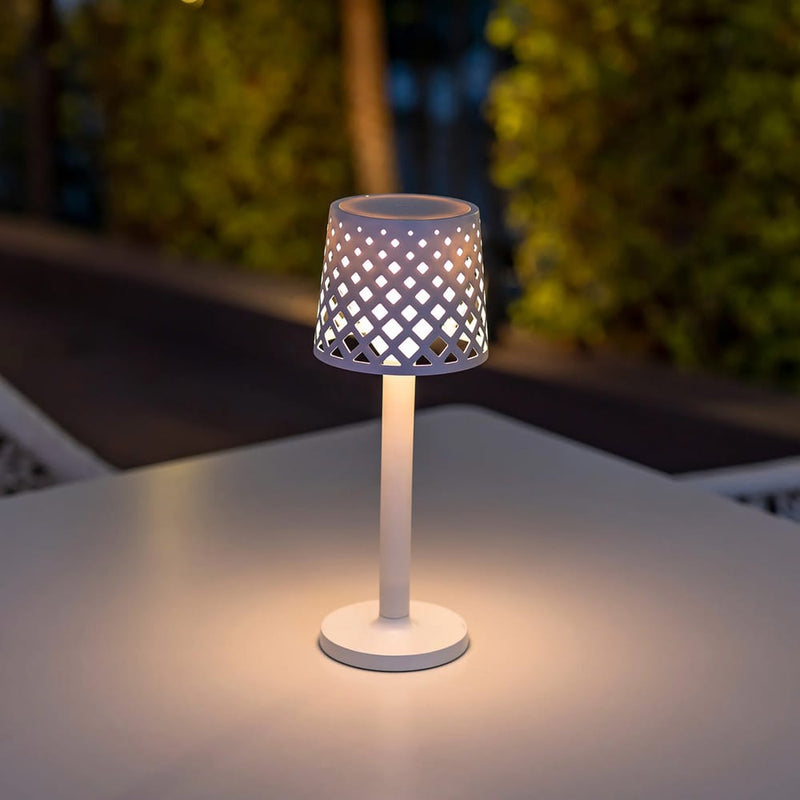 Illuminate your space with Gretita, a touch-activated wireless table lamp, perfect for any home or garden.