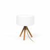 Revamp your ambiance with Chloe by Newgarden, a lamp that blends wood and polyethylene in a unique design.