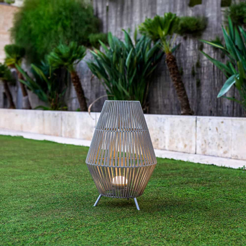 Eco-friendly Conta lamp by Newgarden: cordless, adjustable, and perfect for indoor and outdoor illumination.